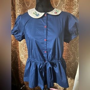 Disney’s Snow White top by The Dress Shop